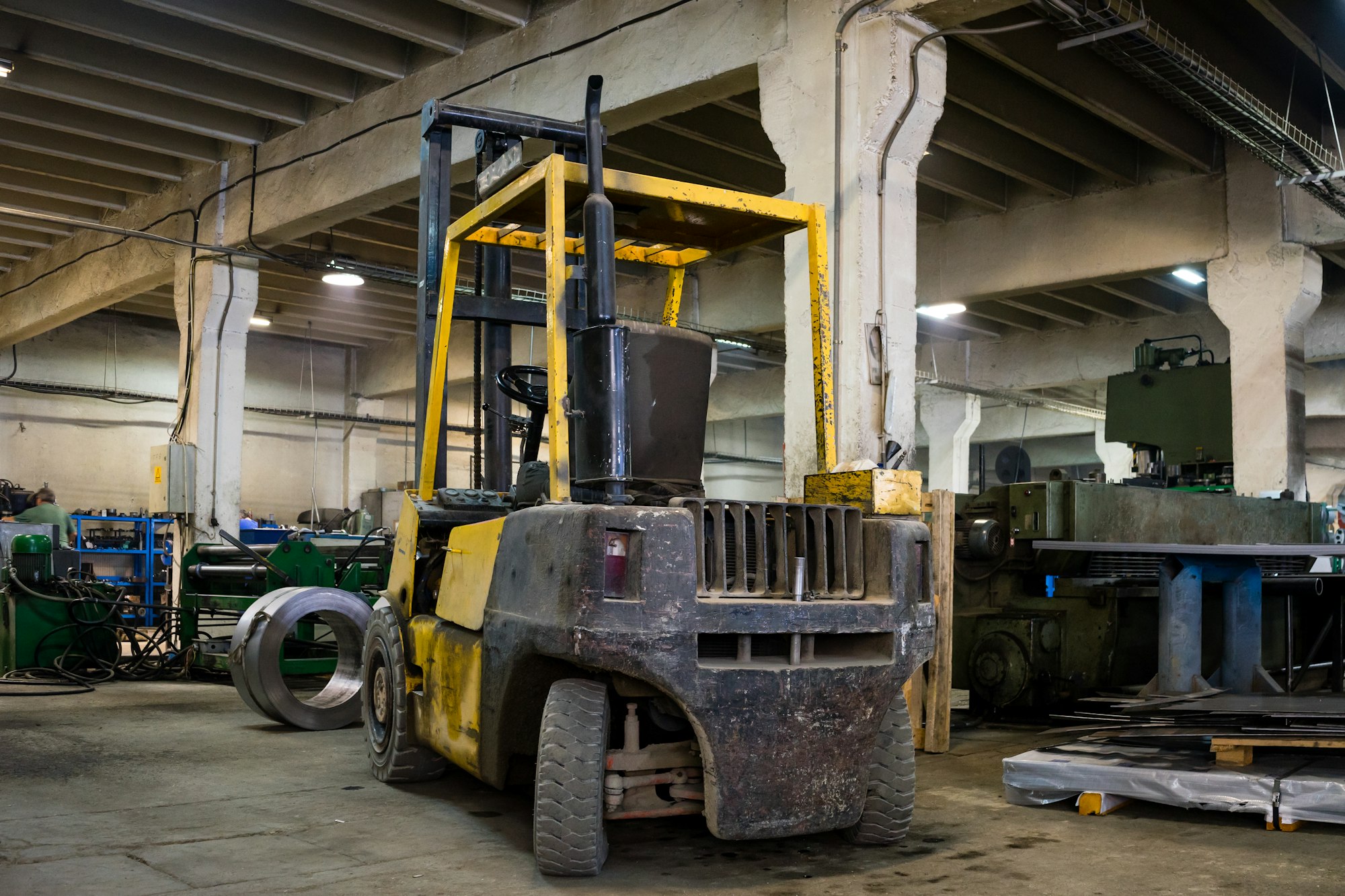 forklift parked inside an industrial hall